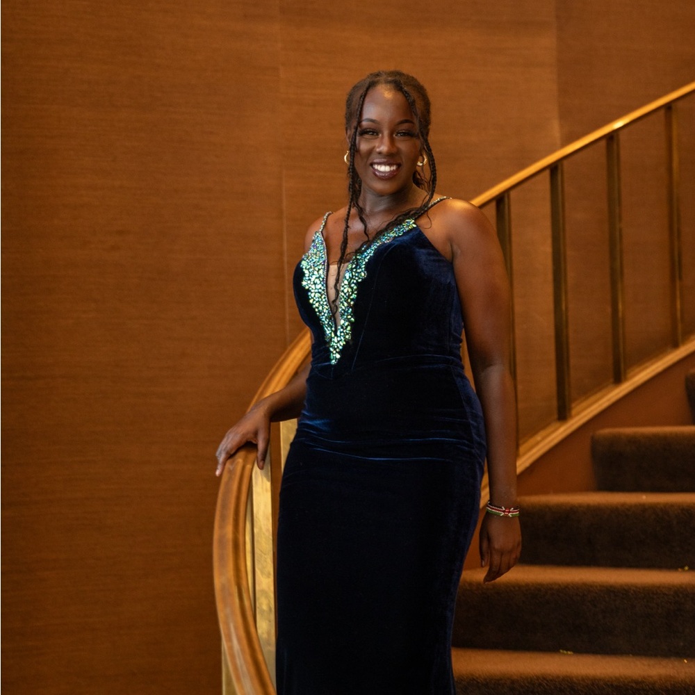 A blue evening gown perfect for prom or pageants